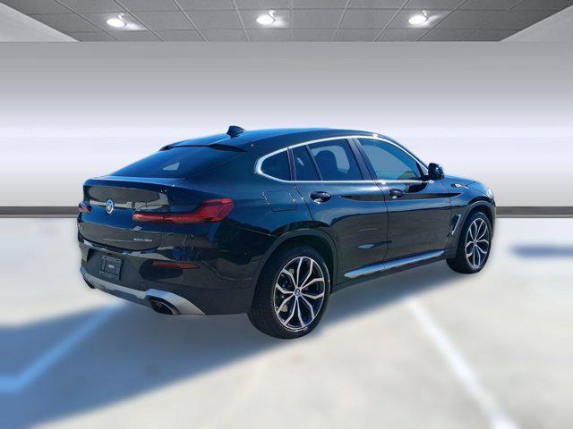 used 2023 BMW X4 car, priced at $38,196