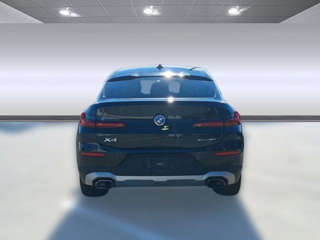 used 2023 BMW X4 car, priced at $38,196