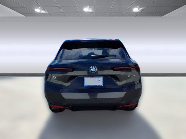 used 2024 BMW iX car, priced at $47,097