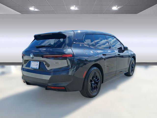 used 2024 BMW iX car, priced at $47,097