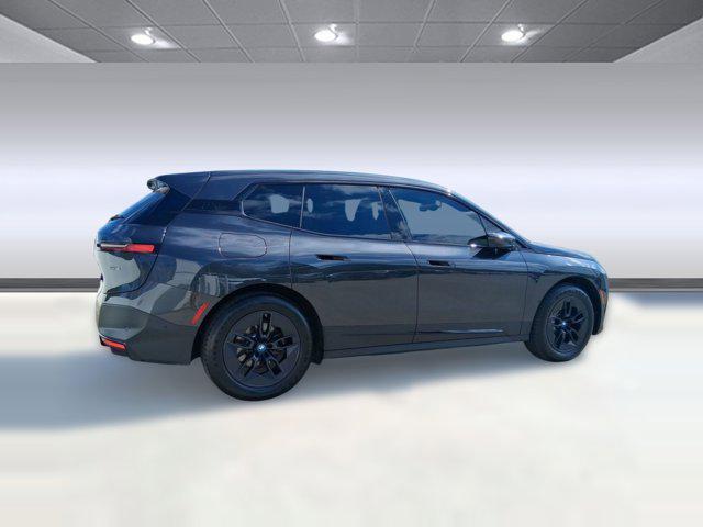 used 2024 BMW iX car, priced at $47,097
