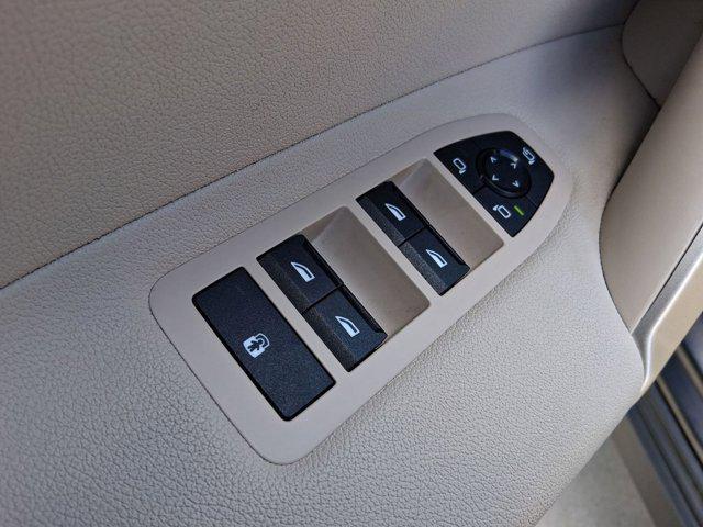 used 2024 BMW iX car, priced at $47,097