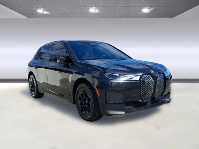 used 2024 BMW iX car, priced at $47,097