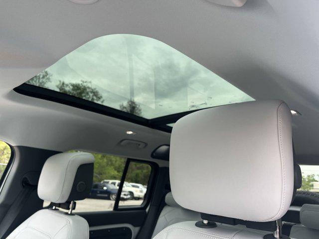 used 2025 Land Rover Defender car, priced at $73,524