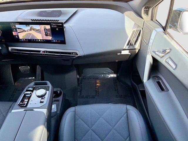 new 2026 BMW iX car, priced at $93,925