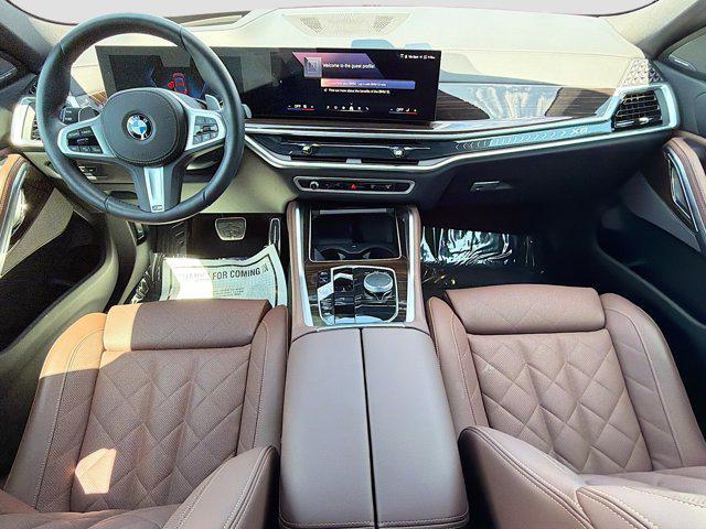 used 2026 BMW X6 car, priced at $77,702