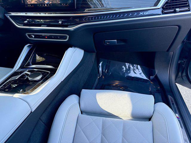 used 2025 BMW X6 car, priced at $73,368