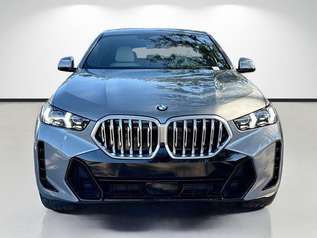 used 2025 BMW X6 car, priced at $73,368