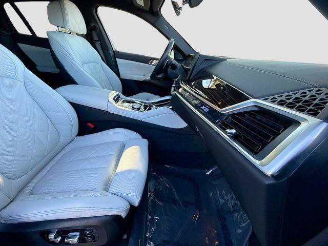 used 2025 BMW X6 car, priced at $73,368