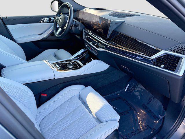 used 2025 BMW X6 car, priced at $73,368