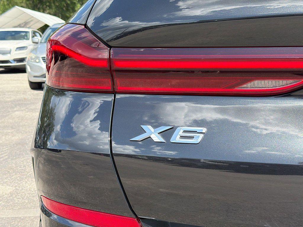 used 2023 BMW X6 car, priced at $53,569