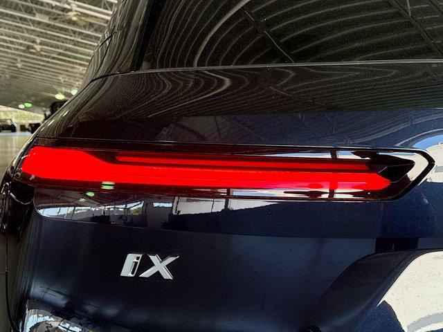 new 2026 BMW iX car, priced at $96,670