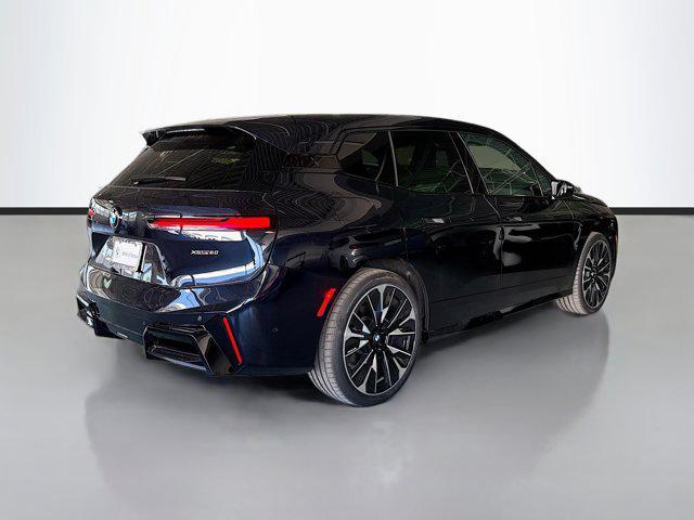 new 2026 BMW iX car, priced at $96,670