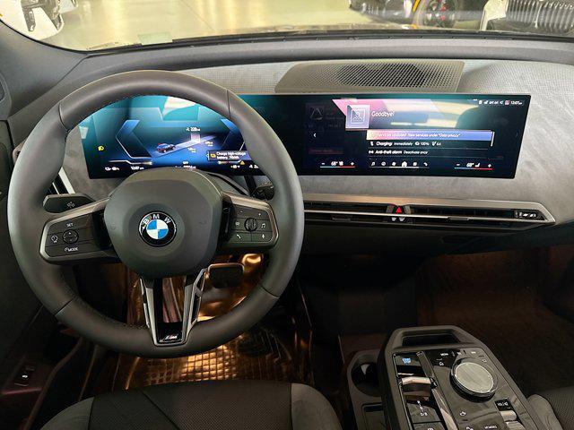 new 2026 BMW iX car, priced at $96,670