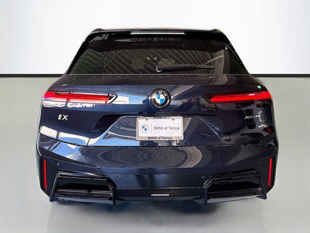new 2026 BMW iX car, priced at $96,670