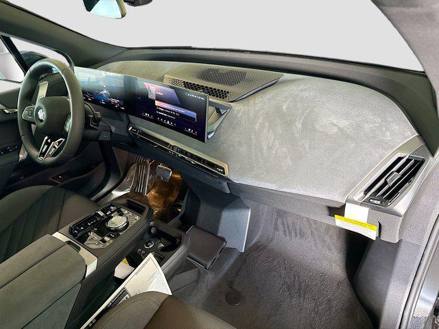 new 2026 BMW iX car, priced at $96,670