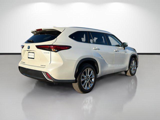 used 2021 Toyota Highlander Hybrid car, priced at $30,358