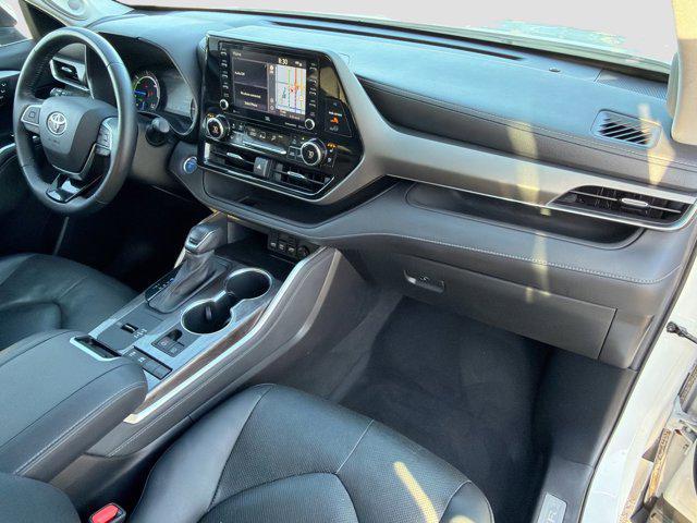 used 2021 Toyota Highlander Hybrid car, priced at $30,358