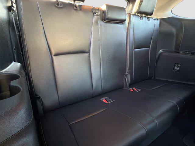 used 2021 Toyota Highlander Hybrid car, priced at $30,358