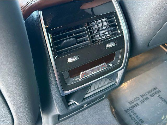 used 2023 BMW X6 car, priced at $47,346