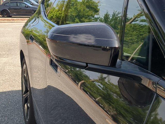 new 2025 BMW iX car, priced at $120,990