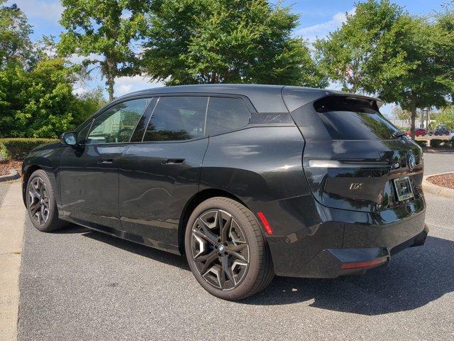 new 2025 BMW iX car, priced at $120,990