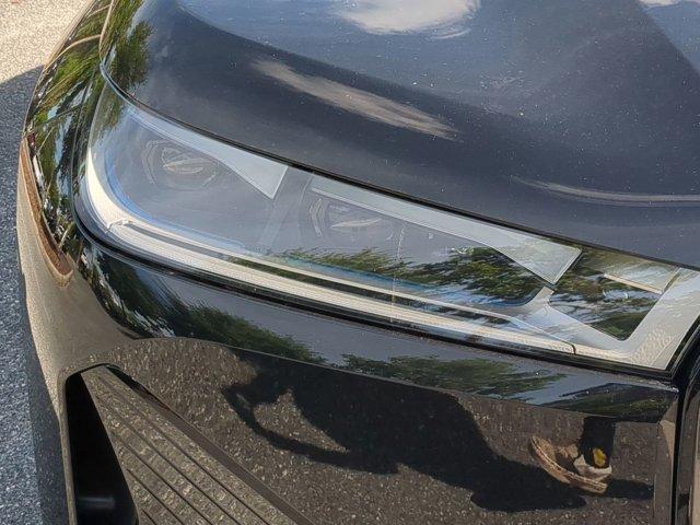 new 2025 BMW iX car, priced at $120,990