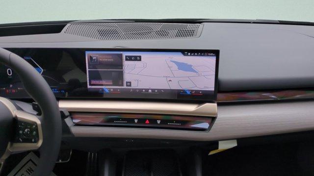 new 2026 BMW 550e car, priced at $87,125