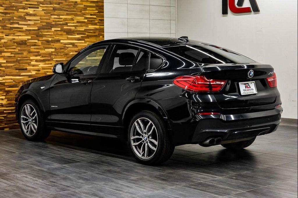 used 2015 BMW X4 car, priced at $12,791