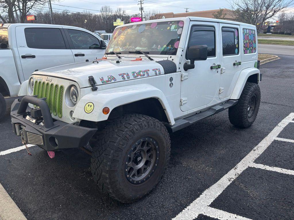 used 2016 Jeep Wrangler Unlimited car, priced at $16,844