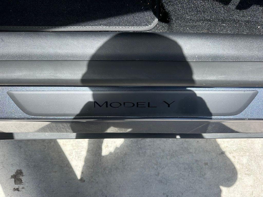 used 2023 Tesla Model Y car, priced at $34,125