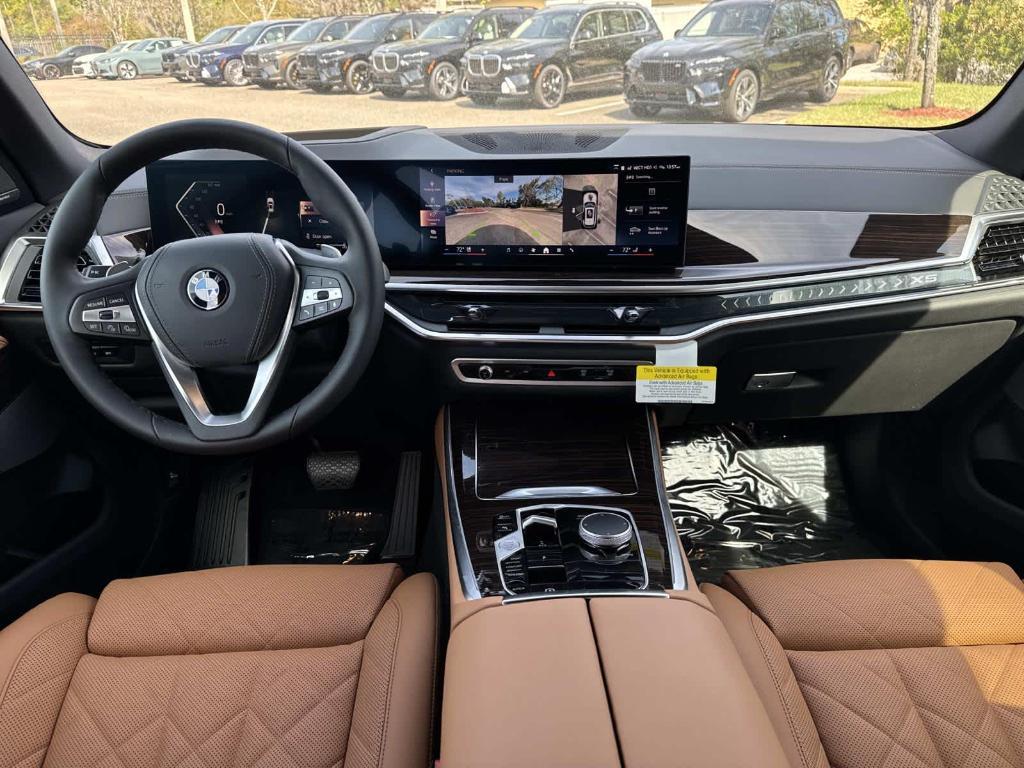 new 2026 BMW X5 car, priced at $77,000
