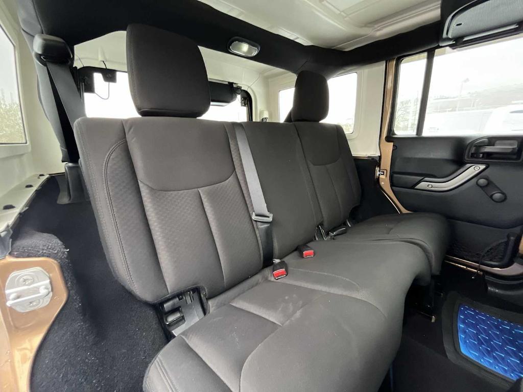 used 2015 Jeep Wrangler Unlimited car, priced at $16,465
