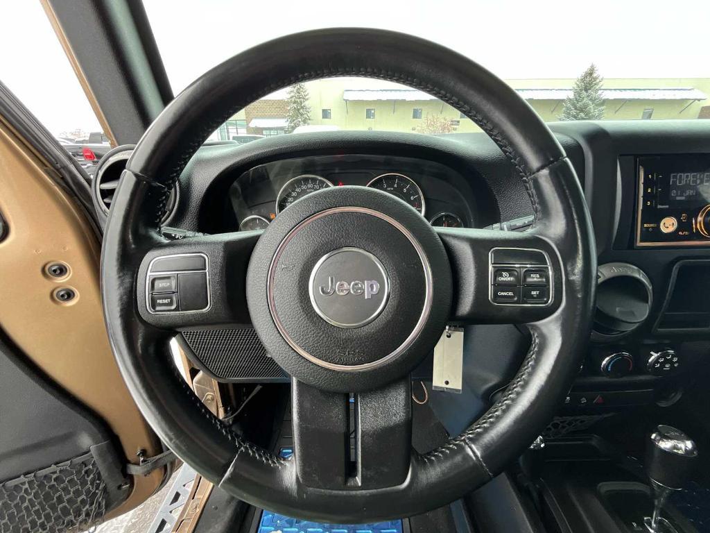 used 2015 Jeep Wrangler Unlimited car, priced at $16,465