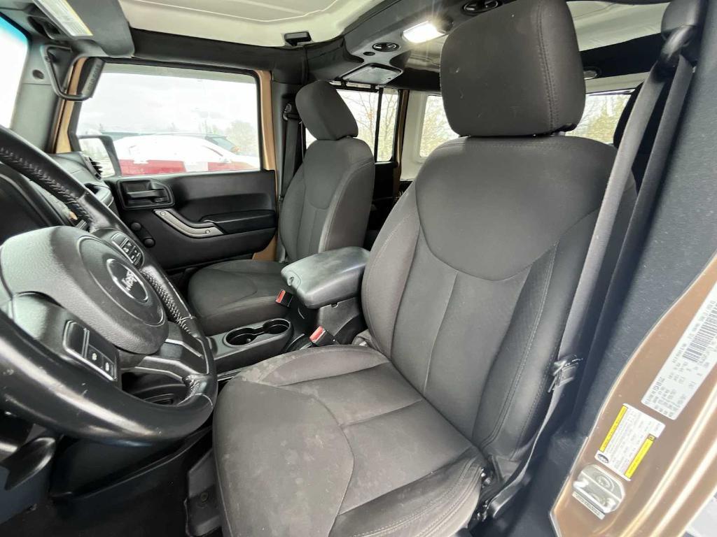 used 2015 Jeep Wrangler Unlimited car, priced at $16,465