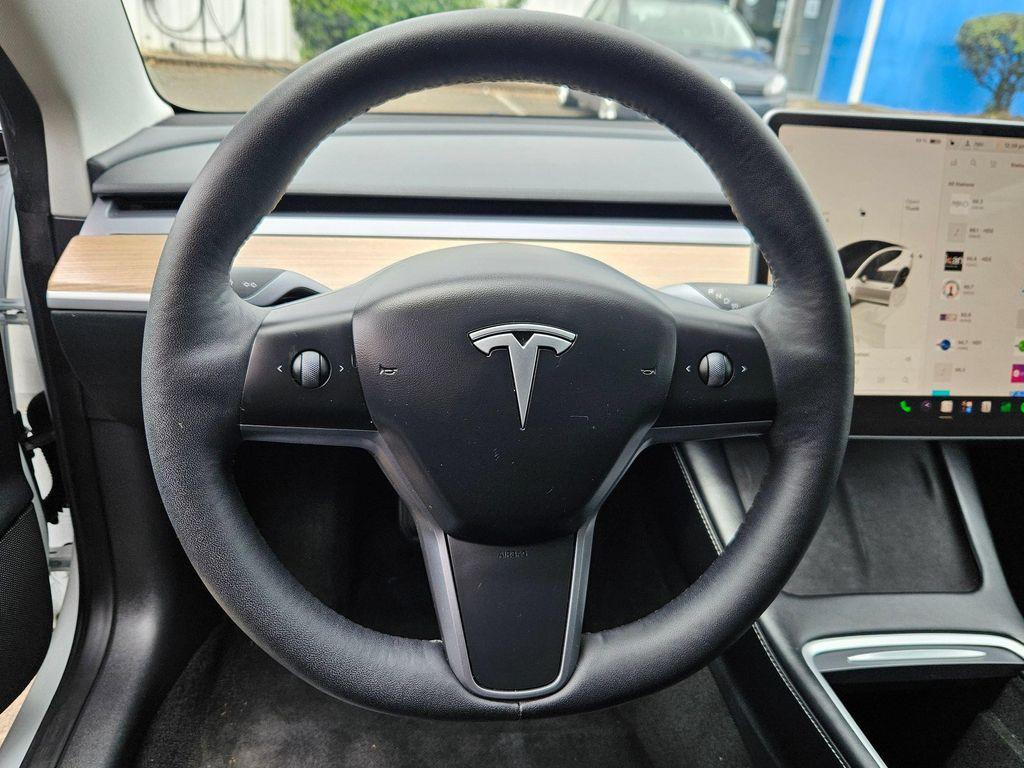 used 2023 Tesla Model 3 car, priced at $26,634