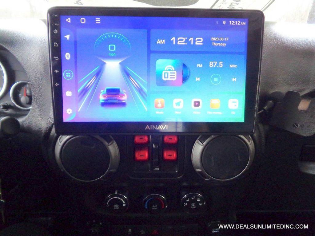 used 2015 Jeep Wrangler Unlimited car, priced at $13,988