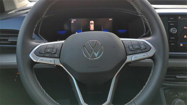 used 2023 Volkswagen Taos car, priced at $22,096