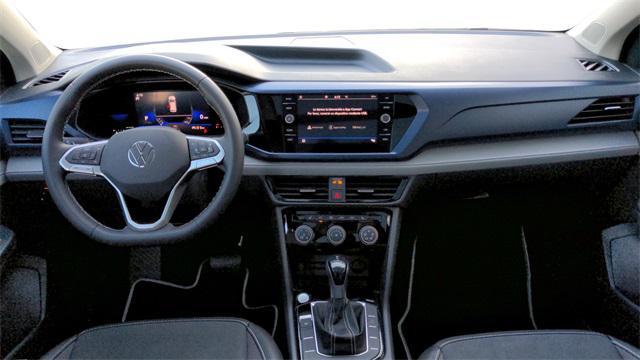 used 2023 Volkswagen Taos car, priced at $22,096