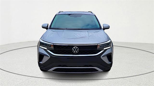 used 2023 Volkswagen Taos car, priced at $22,999