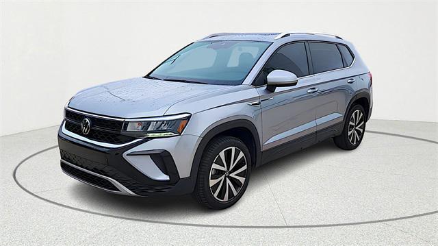 used 2023 Volkswagen Taos car, priced at $22,999
