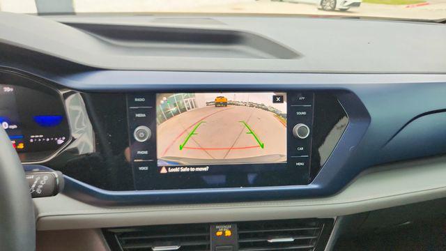 used 2024 Volkswagen Taos car, priced at $22,213