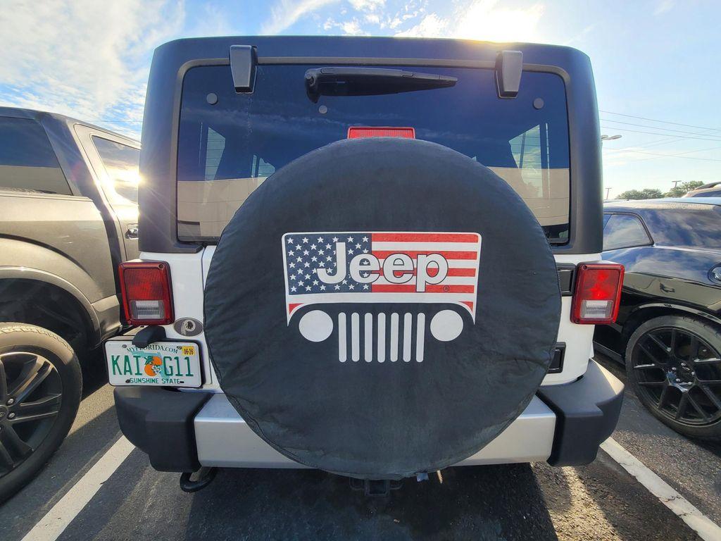 used 2013 Jeep Wrangler Unlimited car, priced at $15,998