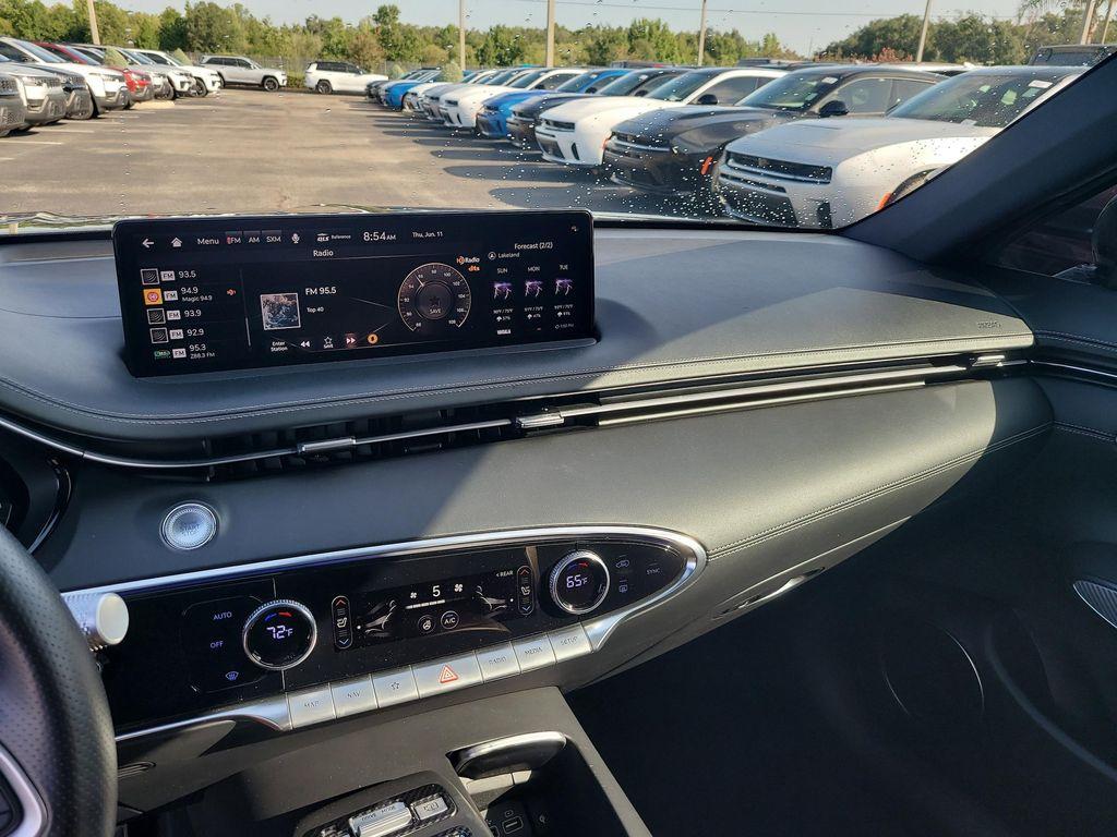 used 2023 Genesis GV70 car, priced at $36,074