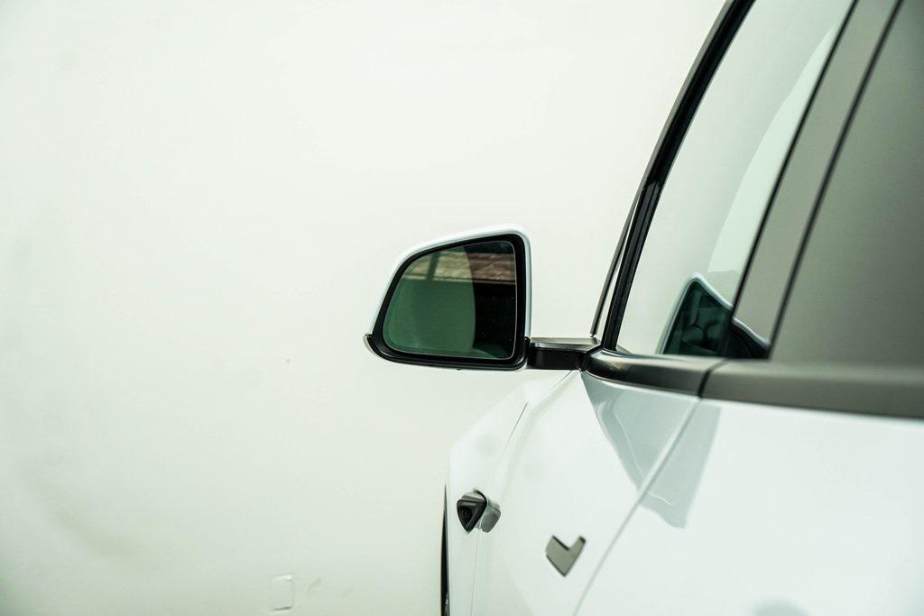 used 2024 Tesla Model Y car, priced at $35,935