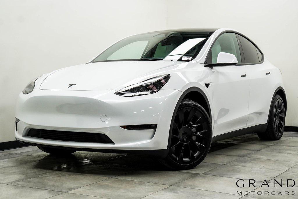 used 2024 Tesla Model Y car, priced at $35,935