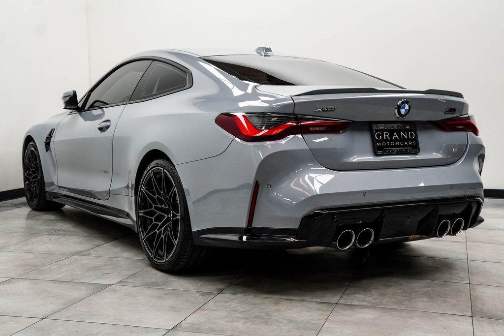 used 2024 BMW M4 car, priced at $73,500