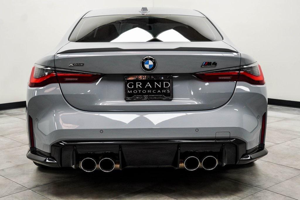 used 2024 BMW M4 car, priced at $74,000