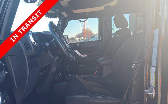 used 2015 Jeep Wrangler Unlimited car, priced at $20,505