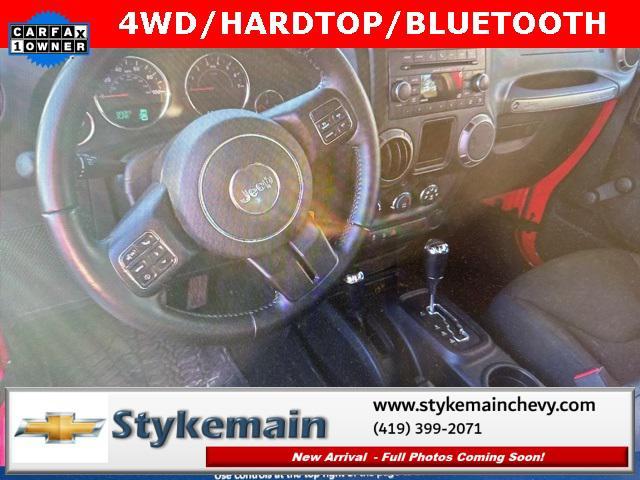 used 2016 Jeep Wrangler Unlimited car, priced at $19,656